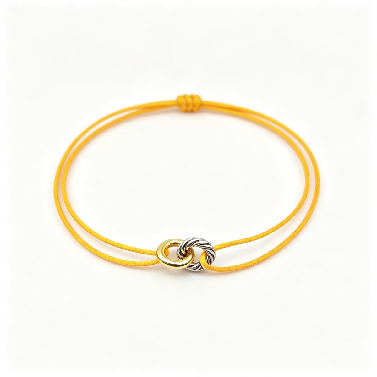 David Yurman Classic Cable Bracelet—gold, with a yellow cord.