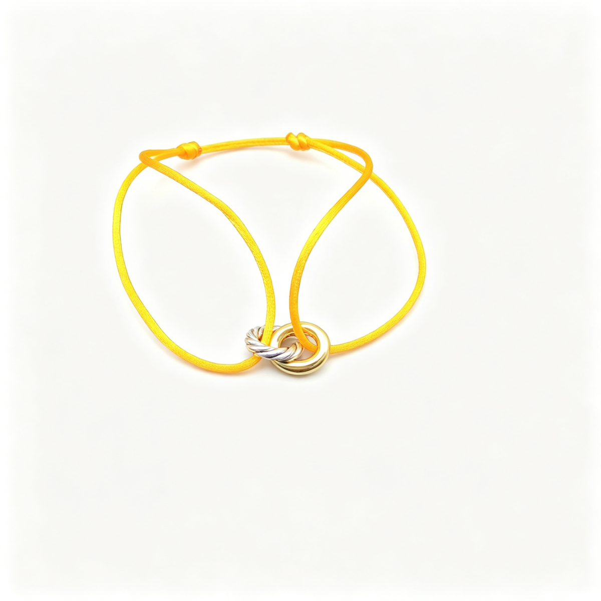 David Yurman Classic Cable Bracelet—gold, with a yellow cord.