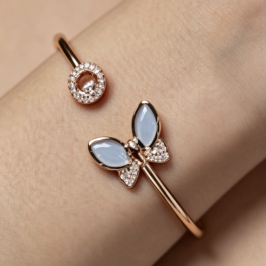 Chopard Happy Diamonds Icons collection rose gold and blue chalcedony butterfly open bangle.