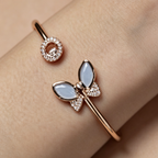 Chopard Happy Diamonds Icons collection rose gold and blue chalcedony butterfly open bangle.