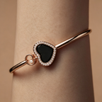Chopard Happy Hearts Style Double-Heart Hinged Bangle (Rose Gold) — Luxury heart-shaped bangle for women, ideal as an anniversary or Valentine's Day gift.
